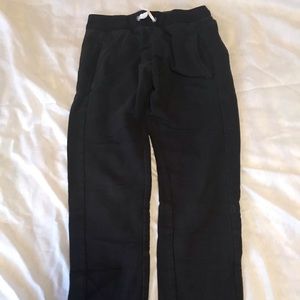 Girls Puma black joggers